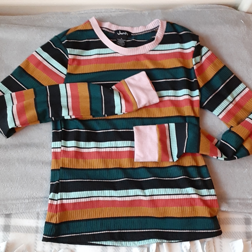 A tight striped long sleeve shirt